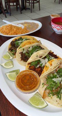 Variety of tacos - al pastor. Carne Asada and shrimp