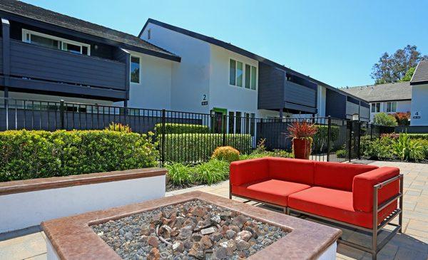 Fire pit by the pool for the Residents!