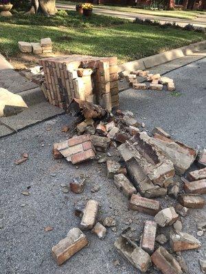 Brick mailbox was hit by a vehicle