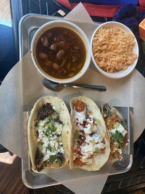 Barbacoa, Buffalo Chicken Taco, Smoked Out Brisket Taco with corn tortilla, rice and beans (beans have bacon)