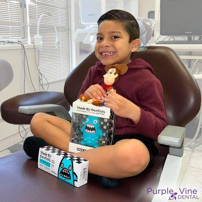 All smiles from our young patient here with us at Purple Vine Dental - we are an advocate for healthy teeth at every age!