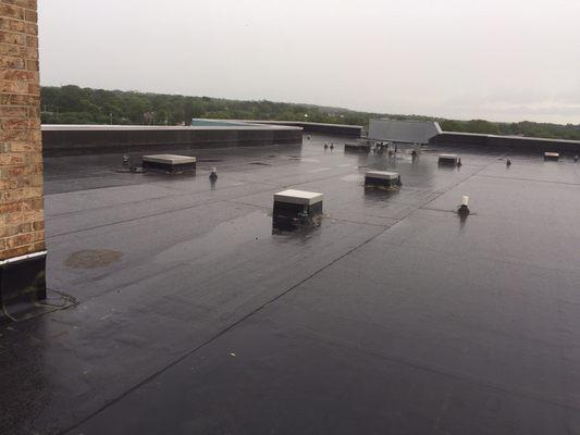 We do commercial buildings. Here's an example of a commercial flat roof we installed.