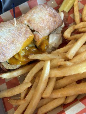 The Sawyer (bbq pork with slaw and a special sauce) and French Fries