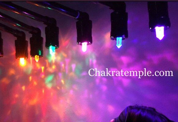 Chakra balancing with pointed quartz crystal light bed. This balancing gives you the ultimate chakra and spiritual healing.