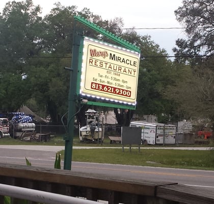 The sign in front of Mary's Miracle Restaurant in Tampa