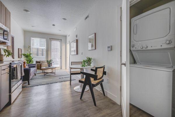 Living room with a view of the laundry closet