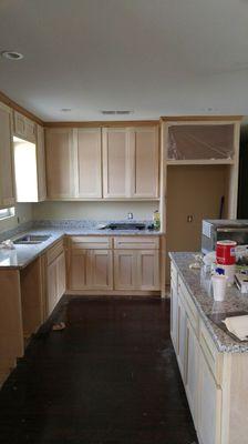 Kitchen in house next to the Mission Funeral Home on E Cesare Chavez St