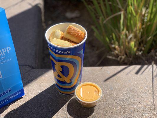 A large set of nuggets with a Cheese Dip.