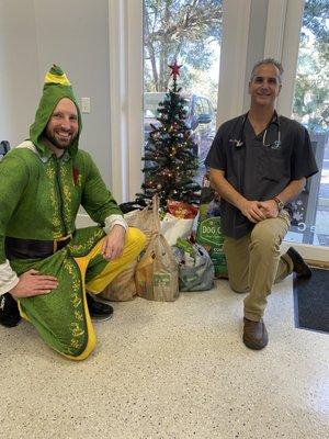 Holiday Food Drive Elves, Dr Clark and Dr. Foye.