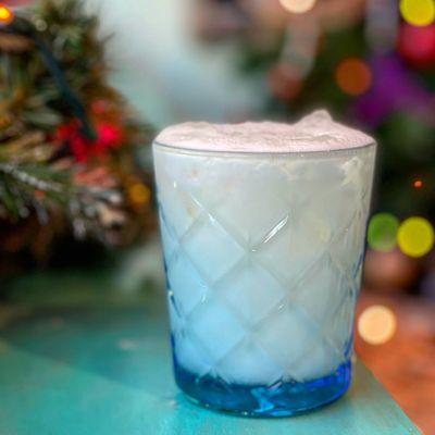 The White Christmas Margarita  is made w/ Casa Noble Tequila, fresh lime juice & coconut milk  Deliciously foamy & strong