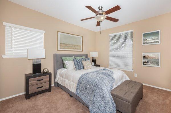 Bedroom with lighted ceiling fan at Lakeview at Parkside