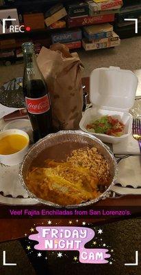 Beef fajita enchiladas, with refried beans and rice with chips and queso.