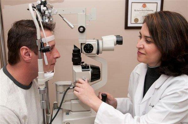 Dr. Singh examining a patient.