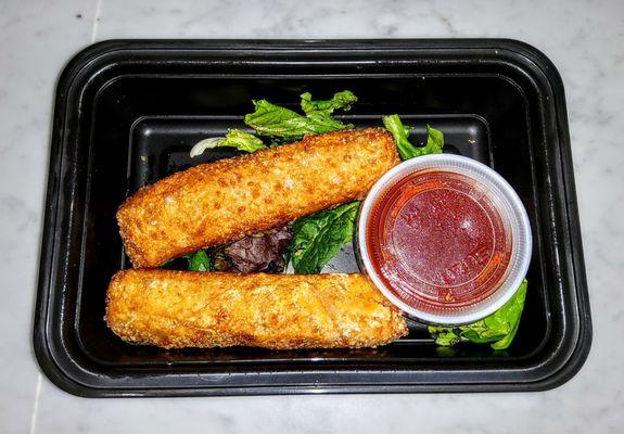 Cheese Steak Spring Rolls filled with Cheddar Cheese, Caramelized Onions and served with - Spicy Ketchup $12