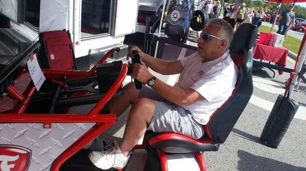 2015 Mullet Festival, lots of fun driving the "Indy Race Car Simulator".