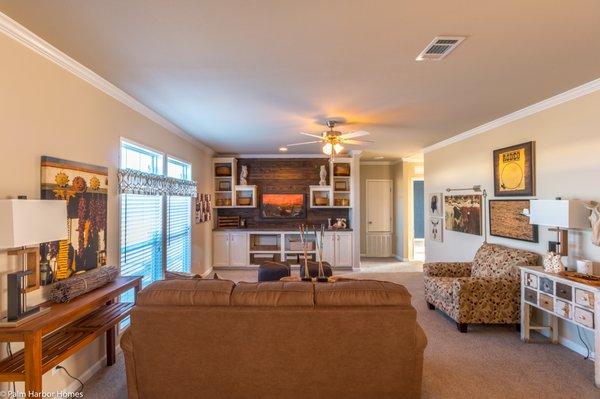 Modern built-in entertainment centers save you hundreds of dollars! Check out this one at Palm Harbor manufactured homes in Waco, Texas.