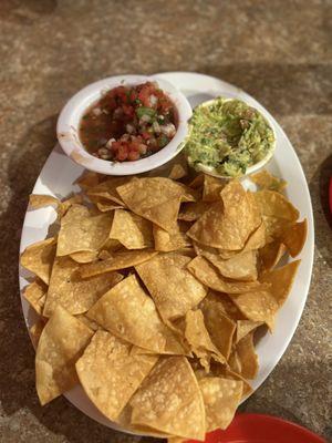 Homemade Chips and Guacamole and salsa