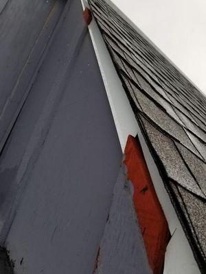 Flashing over the wood? Nah,  just cut out pieces and leave them to expose the rain to go in.