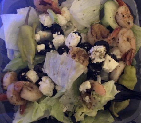 Greek salad (no tomatoes bc I hate them) with grilled shrimp.