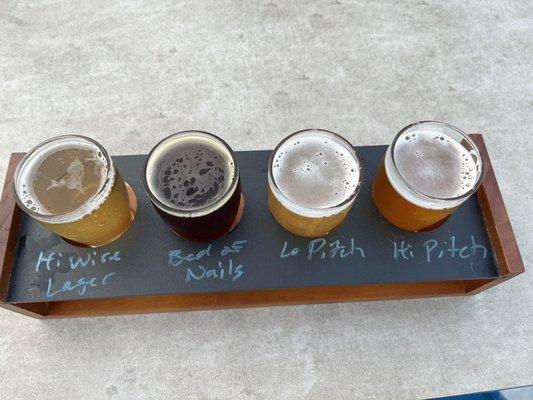 Hi-Wire Flagship flight their top 4 beers available year round