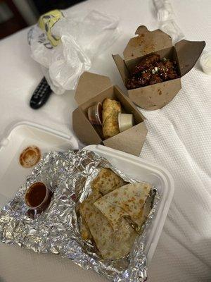 TaKorea's Carnitas, bulgogi egg roll and Korean wings