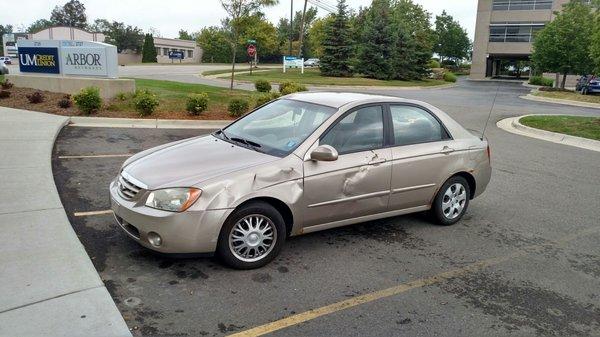 Parked in front of UMCU South Street branch. This car has probably seen better days...