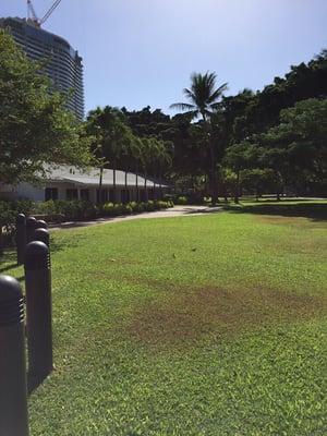 The chapel is located at the end of a paved roadway in an expansive green space