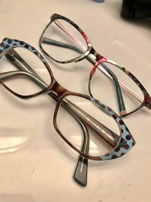 2 pairs of my prescription glasses purchased from Crystal Vision Clinic - floral and polka dot patterns.