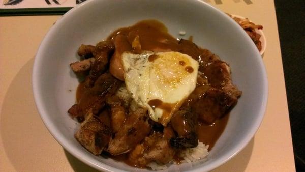 The hungry man special, 2 eggs, 2 spam, fried pork chop, rice and gravy all over... we only got 1 egg tho :(