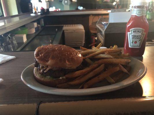 Cheeseburger with fresh cut fries.