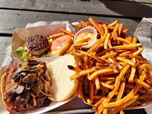 Burger with bacon, mushrooms, and onions, regular fries, and sweet potato fries