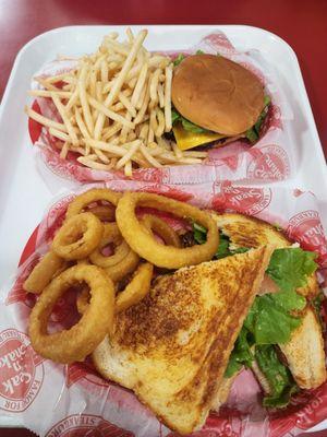 Frisco melt w/onion rings and single with fries