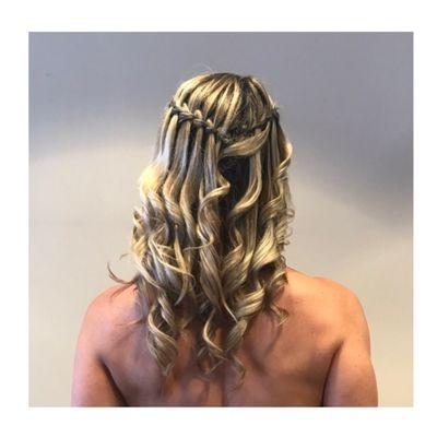 Gorgeous updo done by our stylist, Dawn. Waterfall braids and curls.