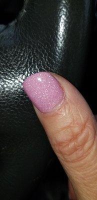 Cuticle was not pushed back, nail looks very messy. Again, just had them done 2 days ago.