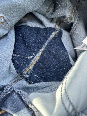 The inside of the jeans.