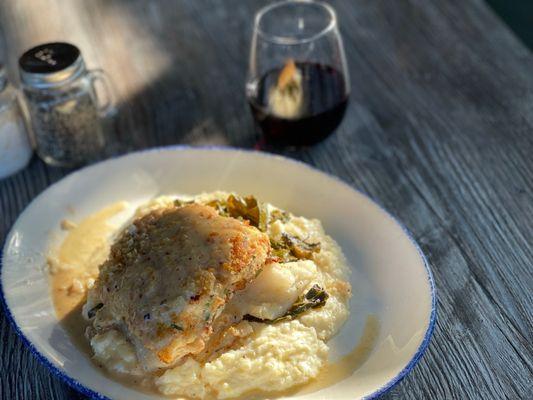 Crab stuffed cod served over stone ground grits