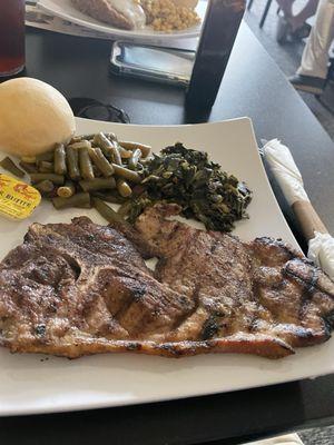 Grilled pork steak with collards and green beans