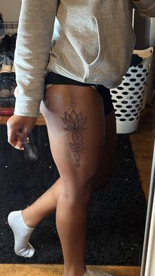 left thigh tattoo