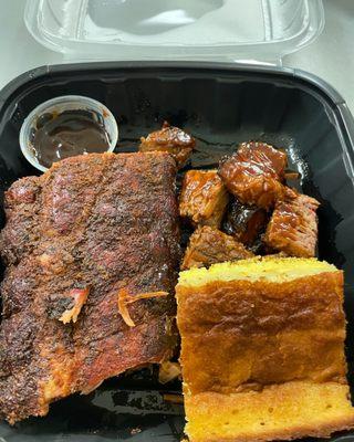 Take out order of ribs and burnt ends (has hidden under the corn bread)