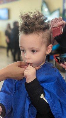 During his haircut with Shannon