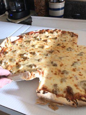 Sausage and cheese pizza