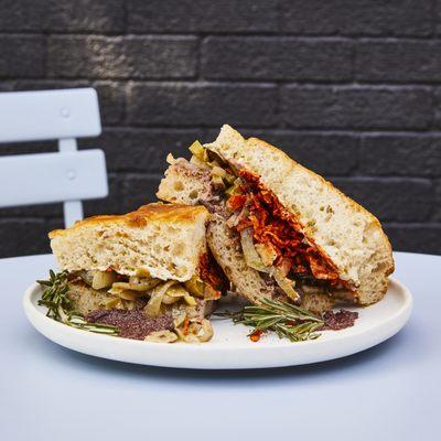 Rosemary's Baby. Our vegan sandwich full of roasted veggies, smoked paprika, olive tapenade, and hummus.