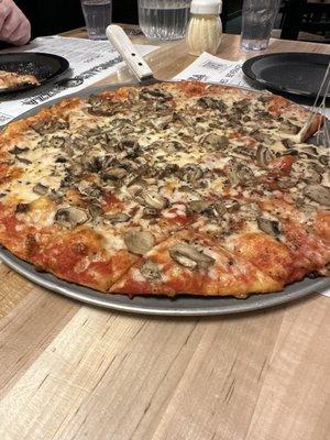 14" Mushroom Thin Crust Pizza. Delicious! Get French dressing.