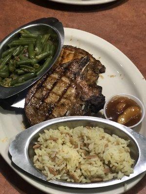 Pork Chops, green beans, and rice pilaf.