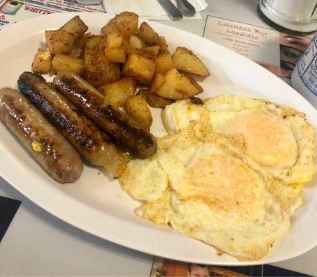 Eggs over easy, sausage links, homefries