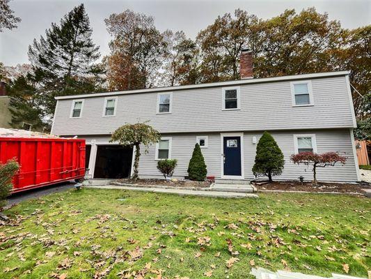 Siding replacement in Lynnfield, MA.  Replaced siding with James Hardie  Plank siding in Pearl Gray.  Trim is PVC.