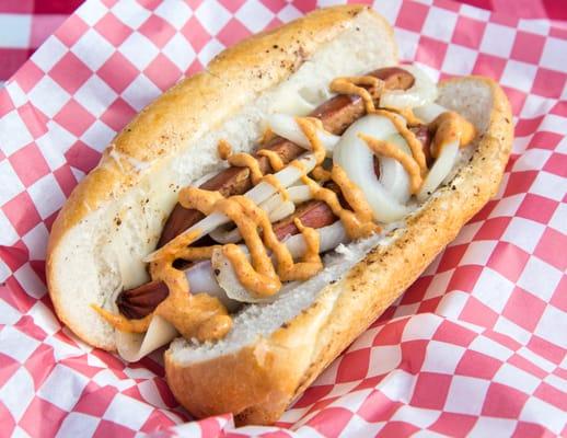 Spicy Hot Sausage - A Spicy All Beef Sausage with Extra Sharp Imported Provolone Cheese, Sauteed Onions and Homemade Mustard Sauce.