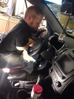 Sean putting the finishing touches on a remote start!