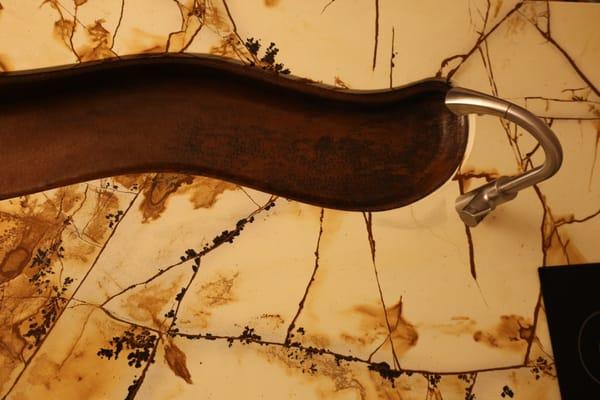 This is a close-up of quartzite that AOCC fabricated for my new kitchen island.  The curve precisely follows the river sink.