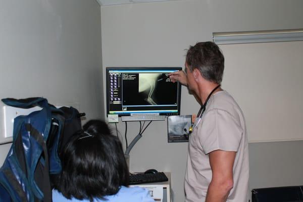 Education is important at LePar! Dr. Whalen explains Radiographs to some of our staff members.